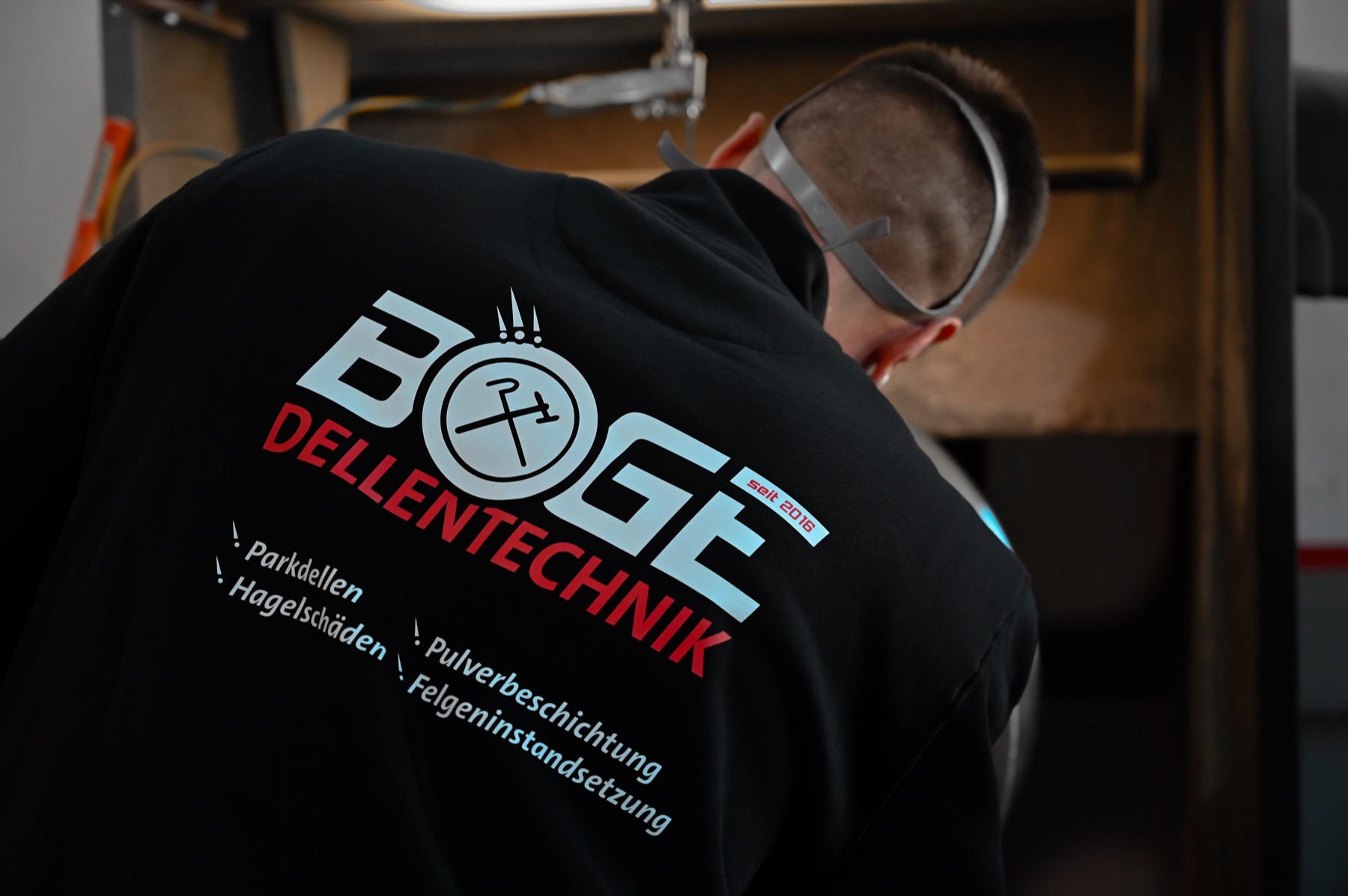 Boge-Logo auf Arbeitskleidung.
